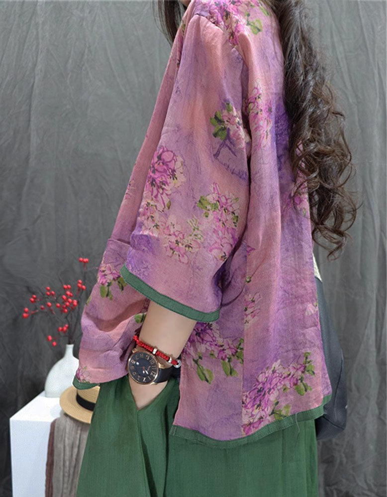 Women wearing vintage floral linen jacket with frog buttons pink side view