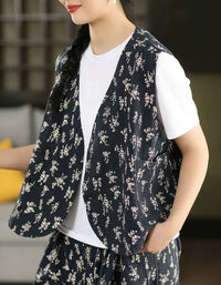 Women's casual floral button-up vest layered over a white T-shirt