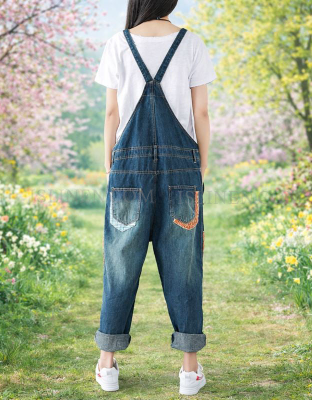 Denim overalls for women paired with sneakers casual look back view