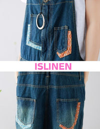 Close-up of patchwork design on women denim overalls