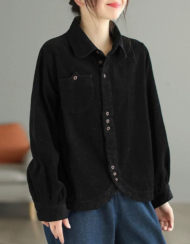 Women wearing black corduroy shirt with front buttons