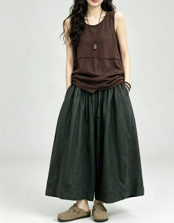 Loose fit cropped denim pants for women featuring high waist design and wide flowing legs