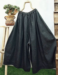 Oversized denim wide leg pants with structured seams and vintage inspired Japanese fashion design