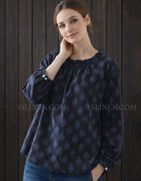 Floral linen blouse paired with wide leg pants