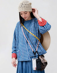 woman wearing blue gingham cotton cardigan loose fit