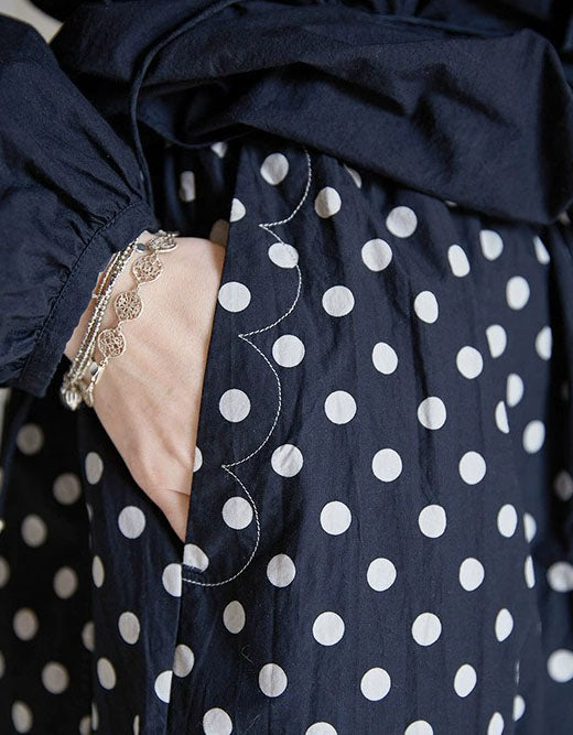 Details of comfortable women’s linen pants with classic polka dot pattern