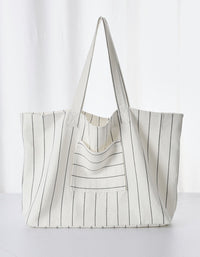 Side profile minimalist striped tote shoulder bag