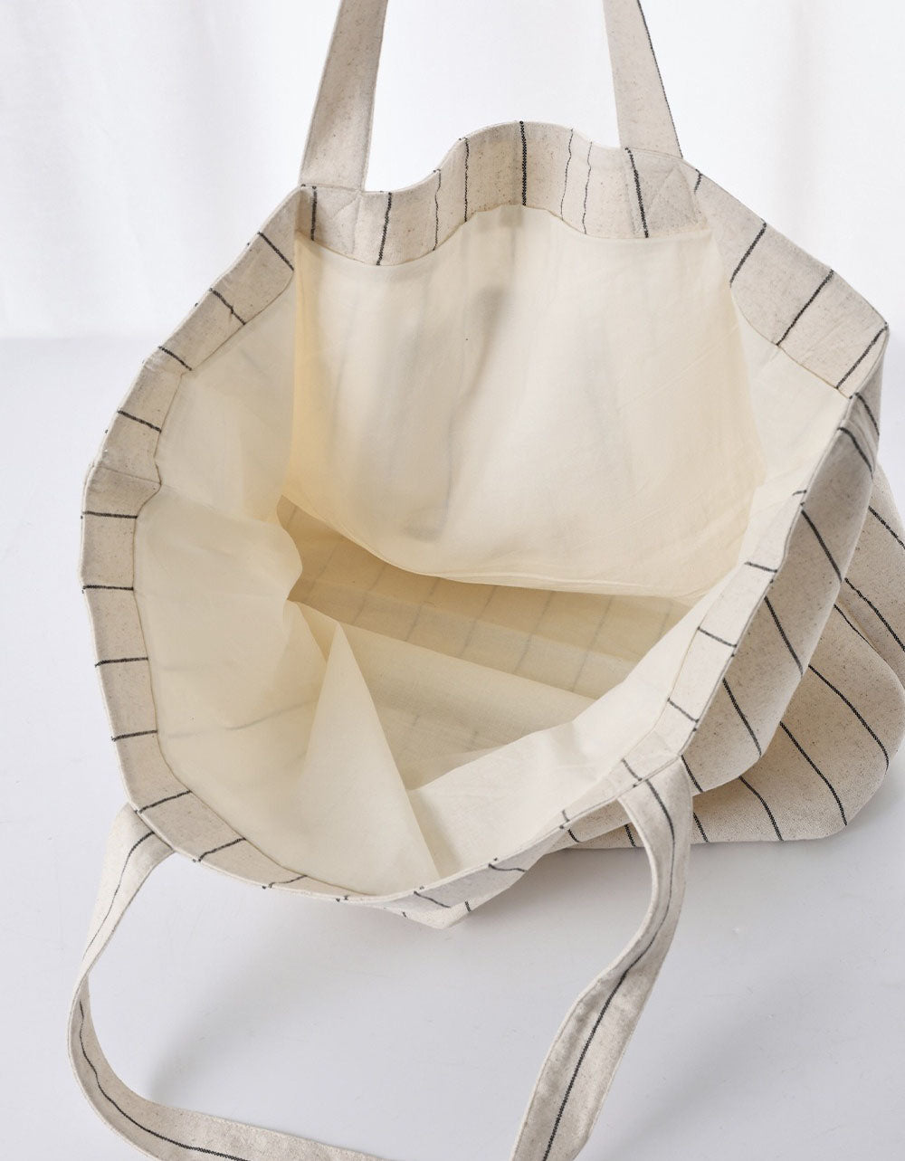 Front view striped canvas shoulder bag for women