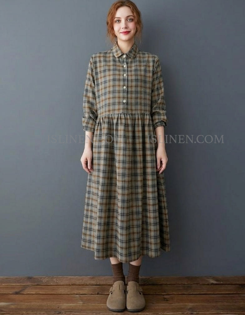 Front view of brown plaid button front shirt dress for women