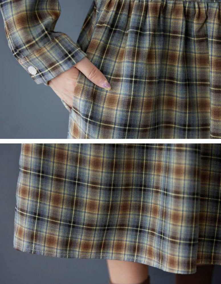 Close up of collar and buttons on plaid midi shirt dress