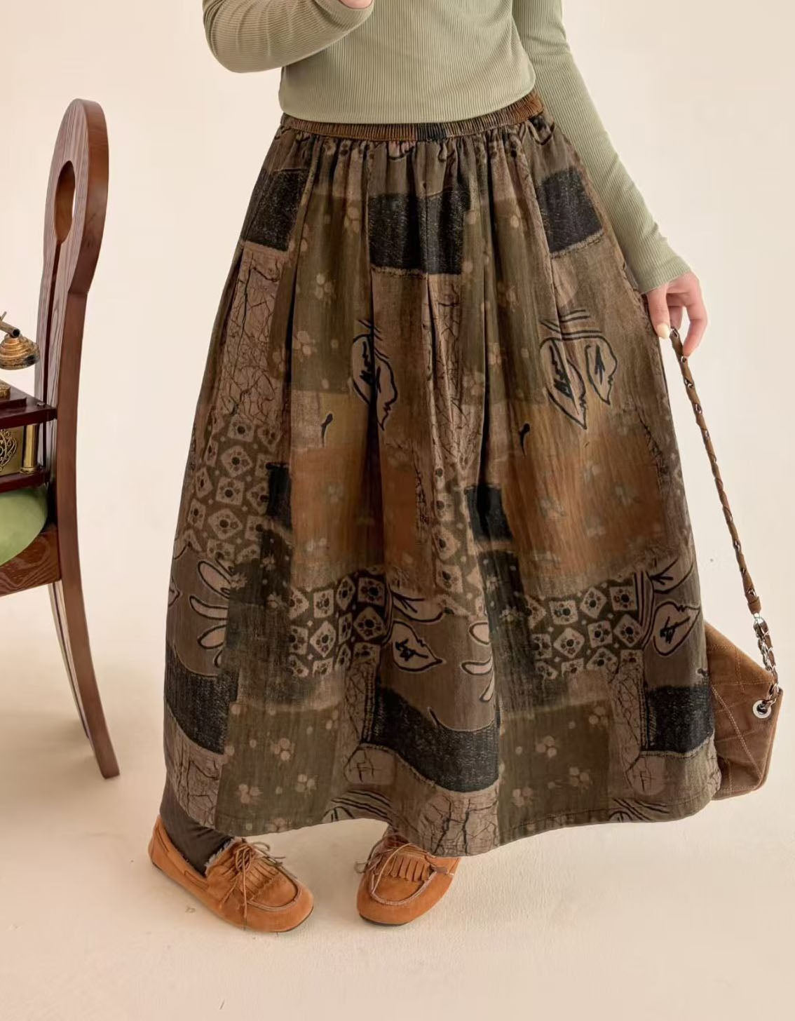 Khaki polka dot A-line midi skirt with elastic waist, front view