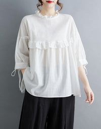 White loose fit blouse with ruffle trim