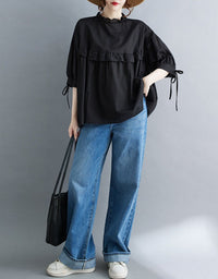 Black ruffle blouse relaxed fit outfit