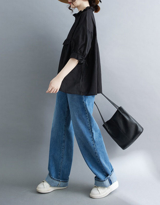 Black oversized blouse with gathered ruffle