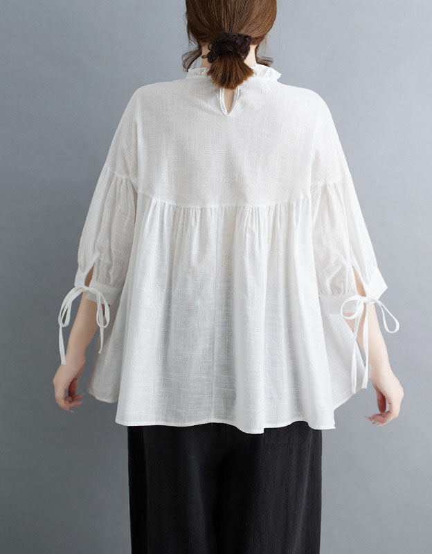 Women’s casual white loose fit top back view