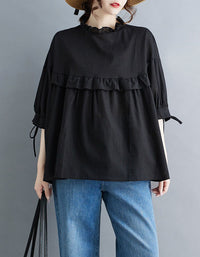 Loose black blouse with three quarter sleeves