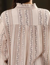 Back view of woman wearing vintage stripe linen tunic dress