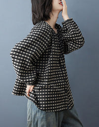 Women’s checkered linen blouse with button front and long sleeves side view