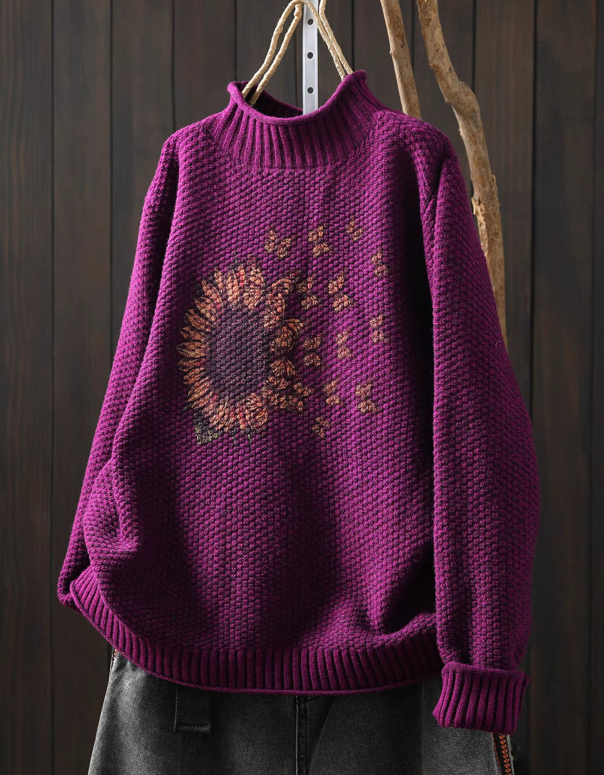 Cozy autumn sunflower knit pullover hanging display purple