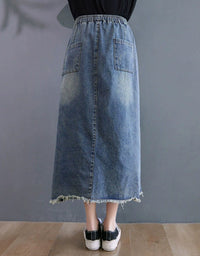 Back view of women’s embroidered denim midi skirt
