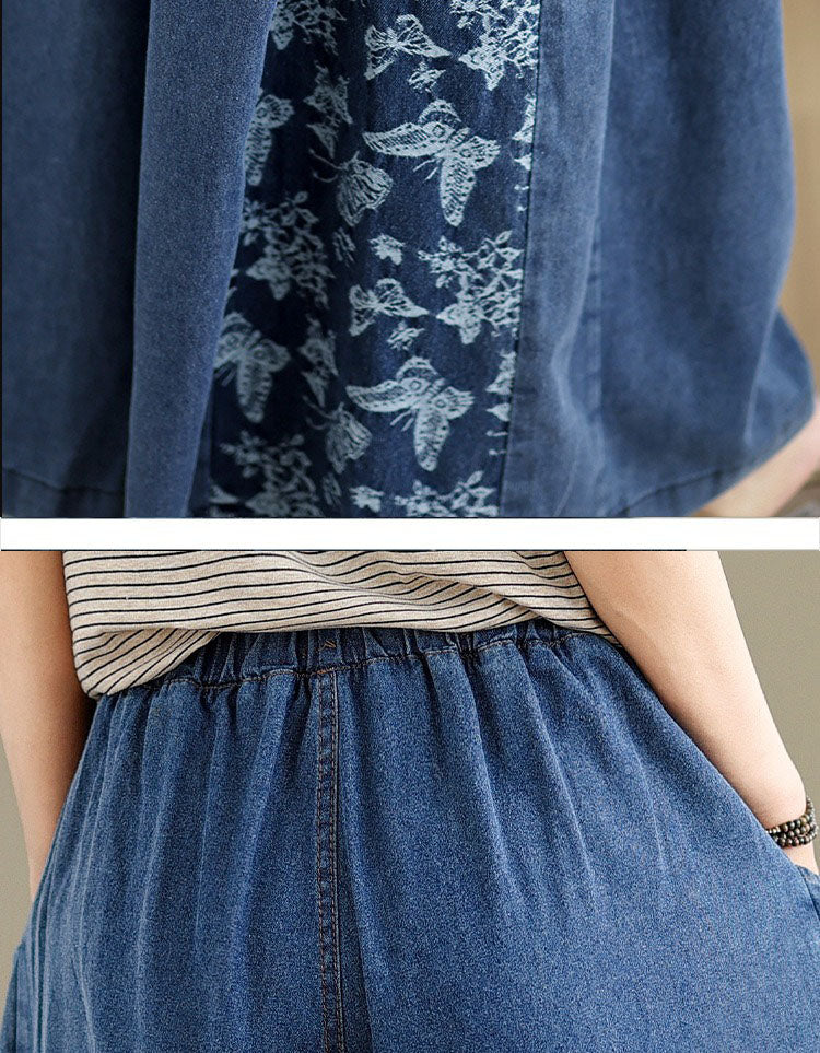 Close-up of floral fabric panel and pocket on women’s wide-leg denim trousers