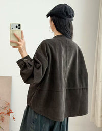 Women's burgundy oversized corduroy button-up shirt front view