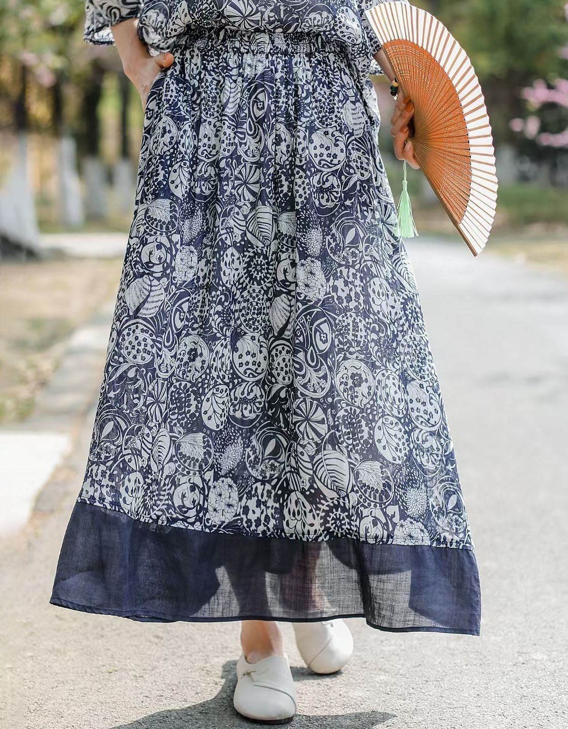 Women’s colorful abstract print boho maxi skirt with elastic waist and flowy silhouette