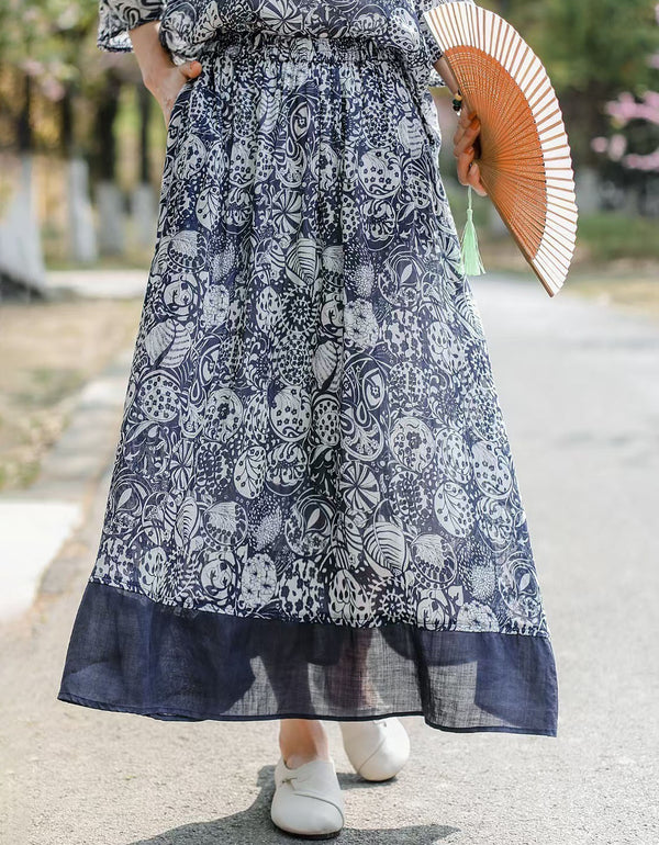 Women’s colorful abstract print boho maxi skirt with elastic waist and flowy silhouette