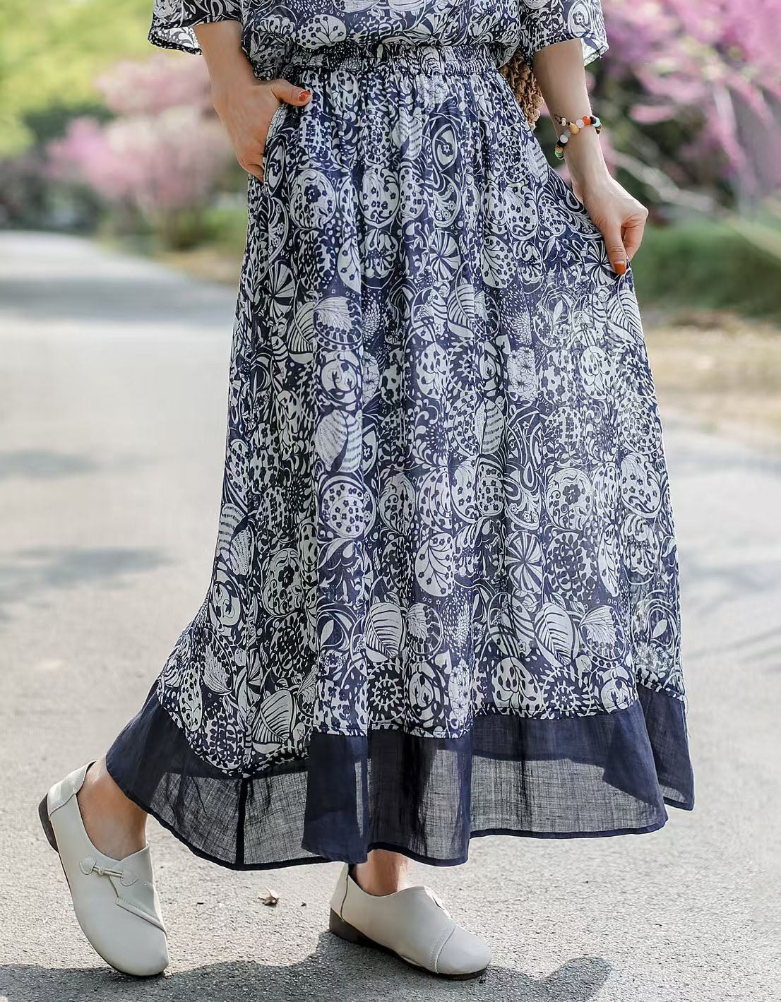 Elegant flowy A-line maxi skirt with multicolor artistic print for women
