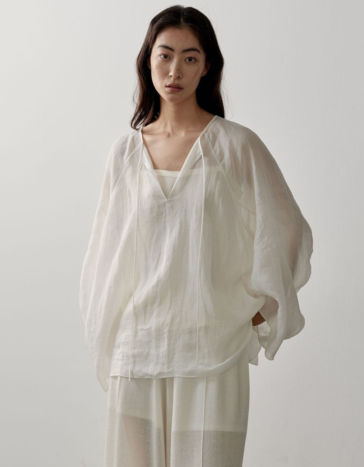 Women's loose linen batwing sleeve blouse front view lightweight sheer summer top