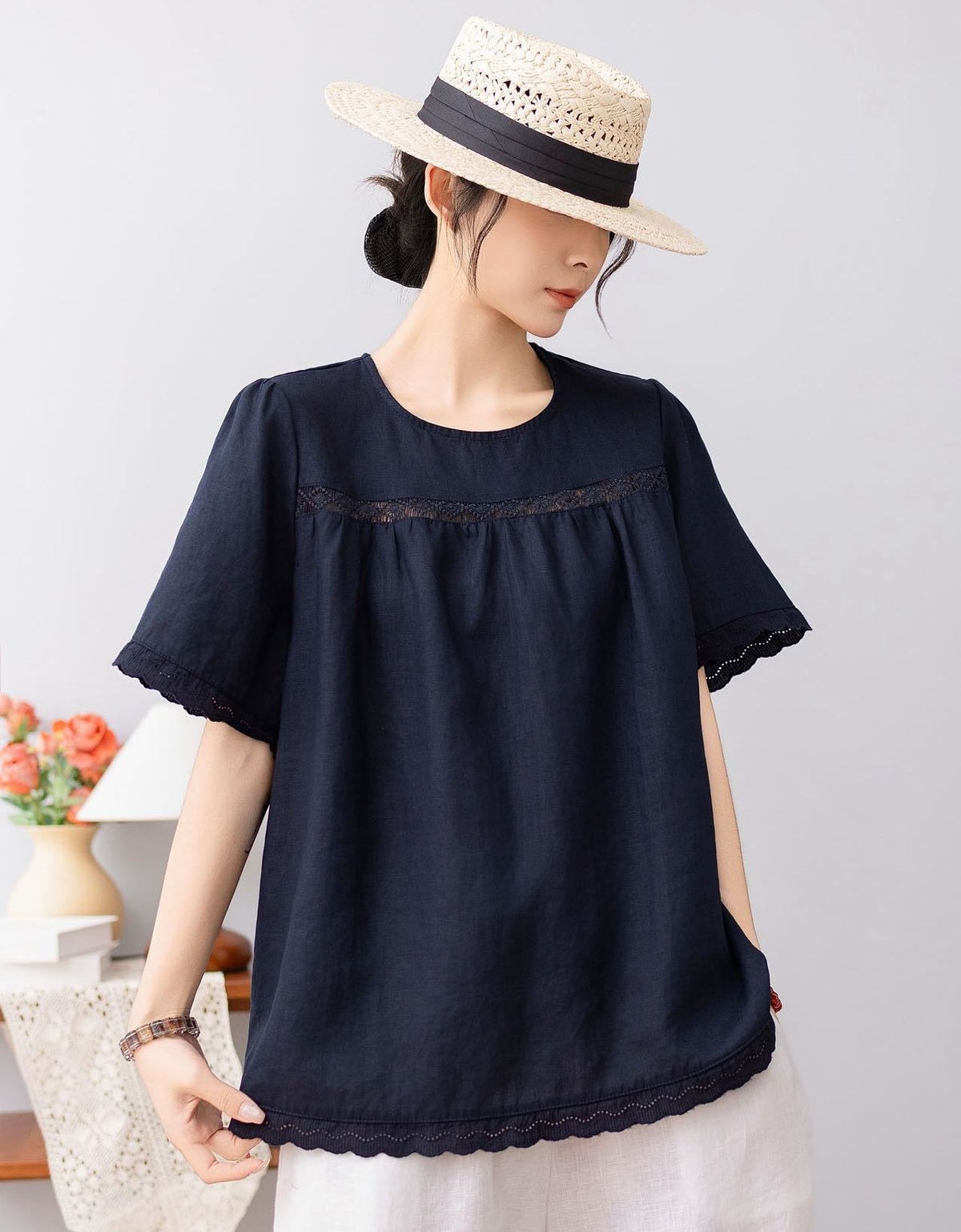 Side view of relaxed fit green summer blouse