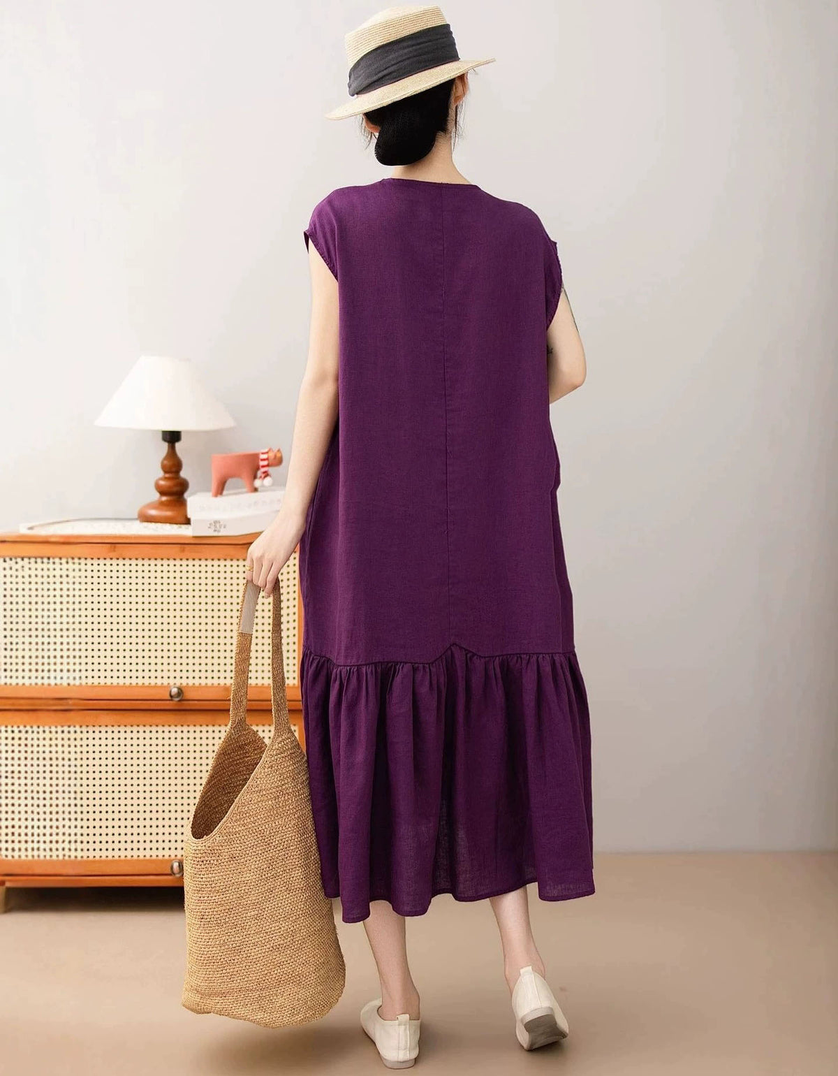 Women’s brown linen midi dress front view with pockets