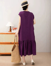 Women’s brown linen midi dress front view with pockets