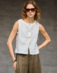 casual cream linen embroidered top styled with white skirt