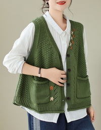Women wearing green knitted vest with embroidery