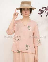 Front view of pink embroidered linen blouse for women casual outfit