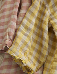 Detail view showing loose fit and casual style