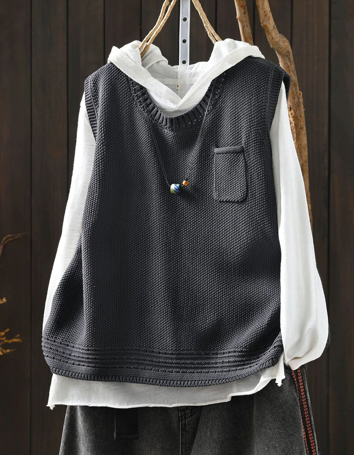 Women's relaxed beige sweater vest casual layering outfit