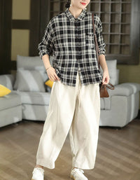Women’s black plaid casual shirt with button front