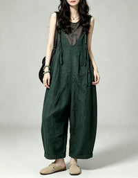 Casual oversized one-piece romper with deep V neckline, drawstring details, and roomy pockets