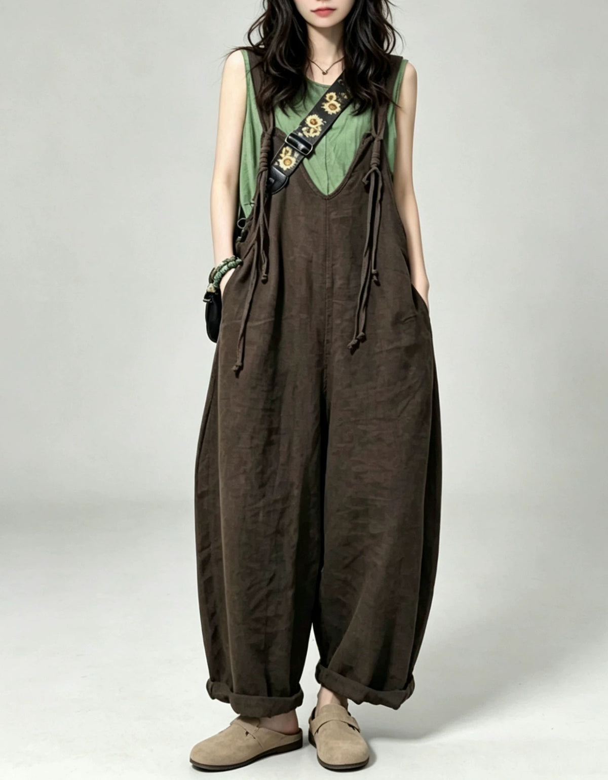 Bohemian inspired wide leg jumpsuit for women in coffee with a relaxed minimalist design