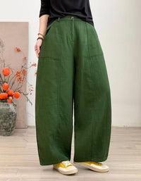 Green wide leg pants for women with utility side pockets
