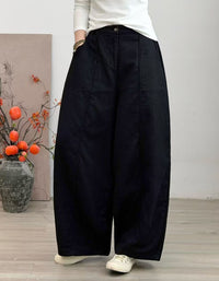 Relaxed fit black wide leg pants styled for casual wear