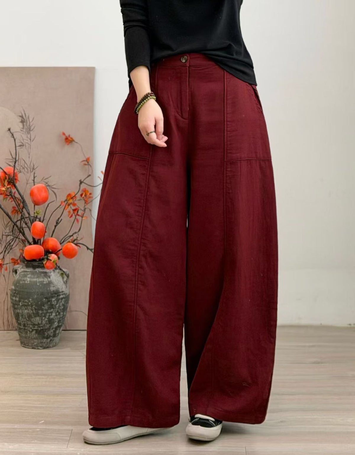 Red casual wide leg pants showing front button closure