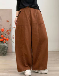Women's loose fit caramel trousers with wide leg silhouette