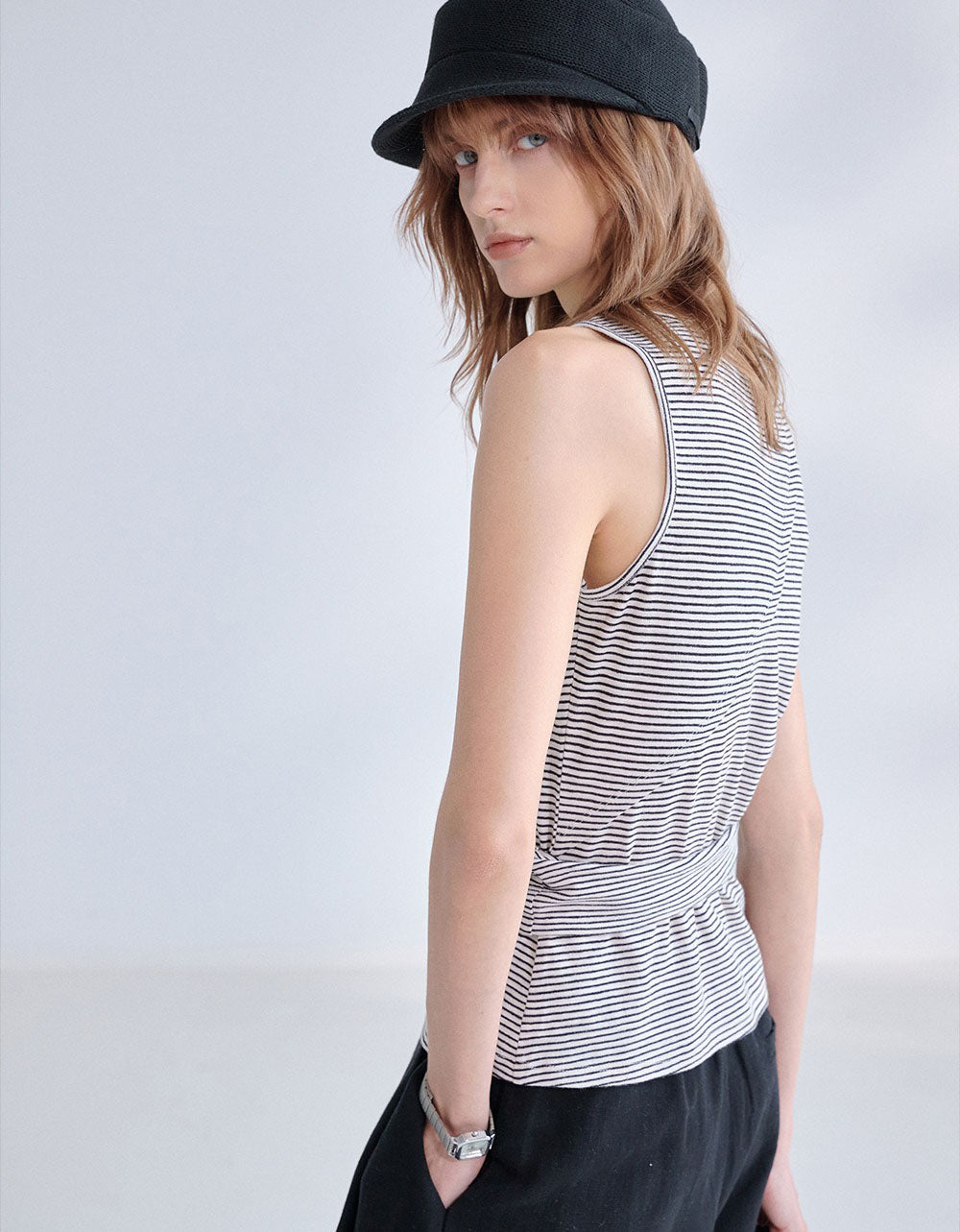 Women’s black and white striped sleeveless tank top with matching scarf detail