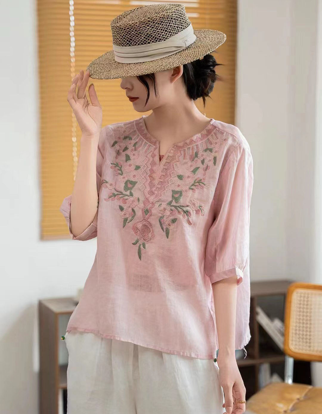 Front view of pink embroidered linen blouse women casual outfit