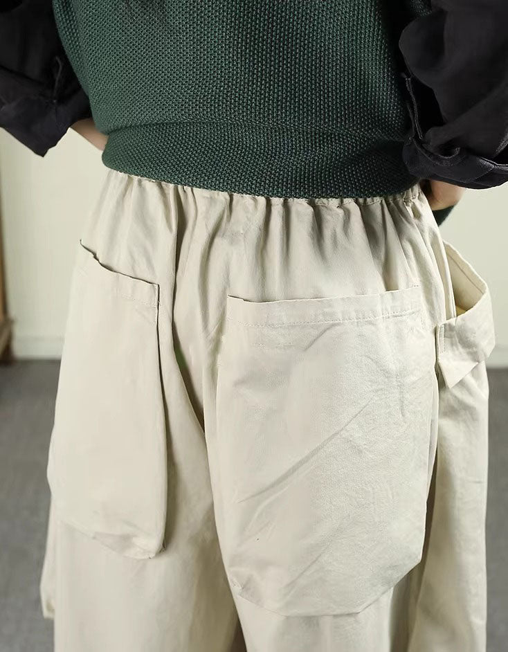Back view of women’s yellow wide-leg cotton pants with drawstring