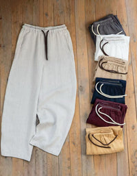 Breathable linen lounge pants with wide leg cut and drawstring waist for travel and vacation outfits