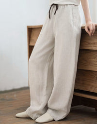Comfortable high waist linen trousers for women with flowing wide leg silhouette and soft breathable fabric